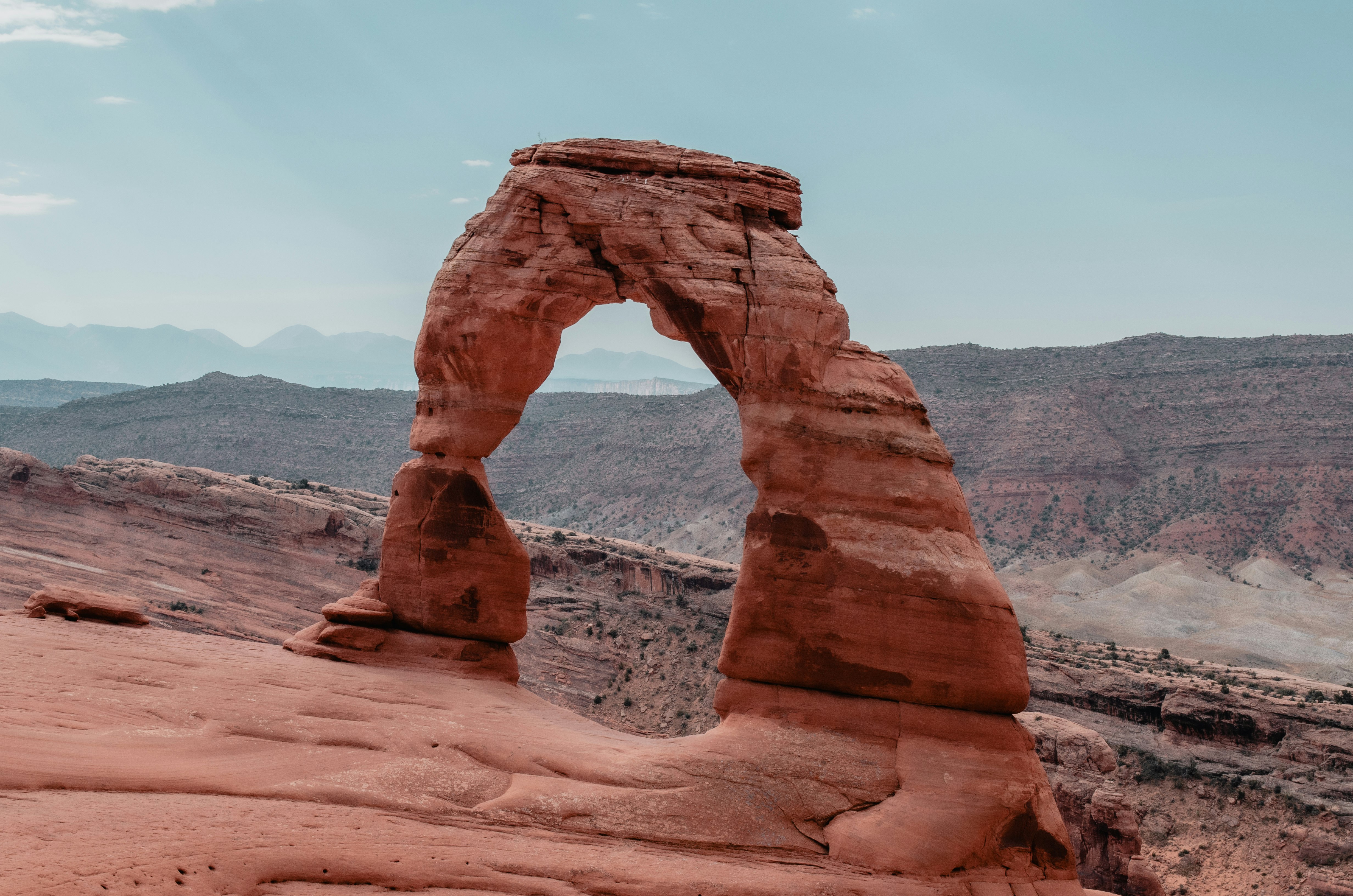 brown rock formation under blue sky during daytime